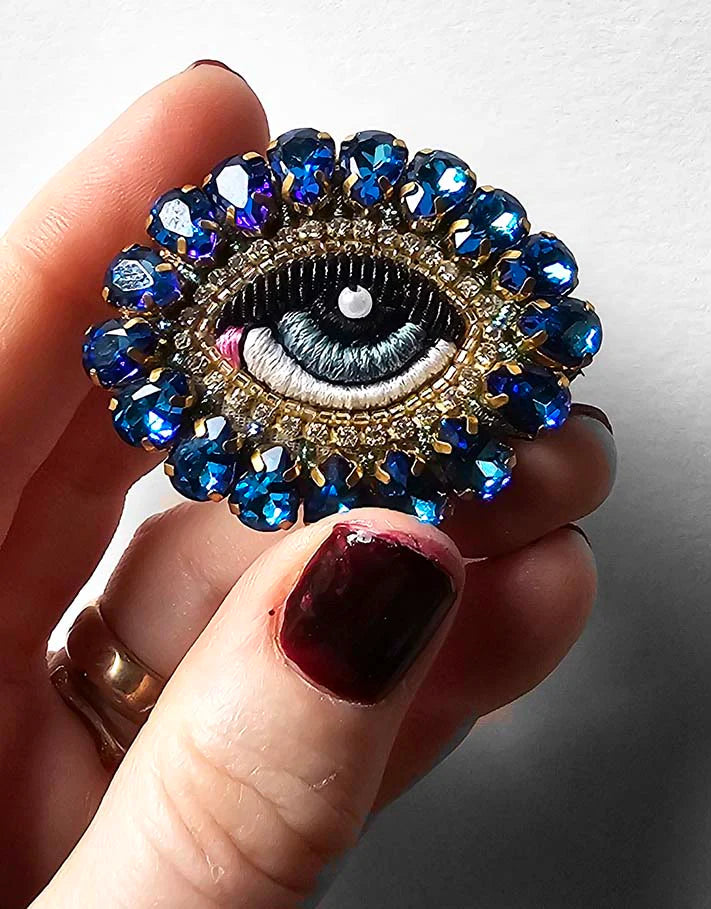 Eye brooch sales